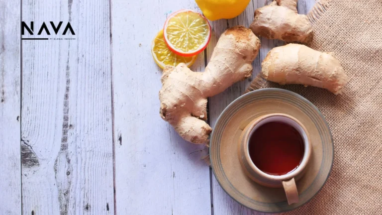 Top view of ginger tea on wooden background of maklon produk herbal